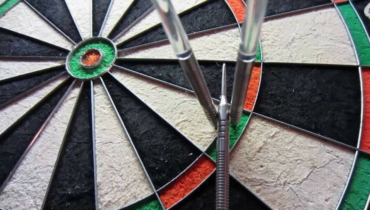 make darts stick to dartboard